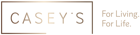 Casey's logo in gold lettering on a black background with the tagline For Living. For Life. displayed beside the brand name in clean, modern type.