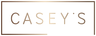 Gold Casey's Kitchens logo with minimalist lettering on a black background, framed by a thin border and centered for a clean modern brand mark.